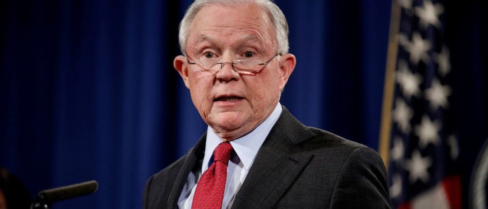 FILE PHOTO: U.S. Attorney General Jeff Sessions speaks during a news conference to discuss "efforts to reduce violent crime" at the Department of Justice in Washington, U.S., December 15, 2017. REUTERS/Joshua Roberts/File Photo