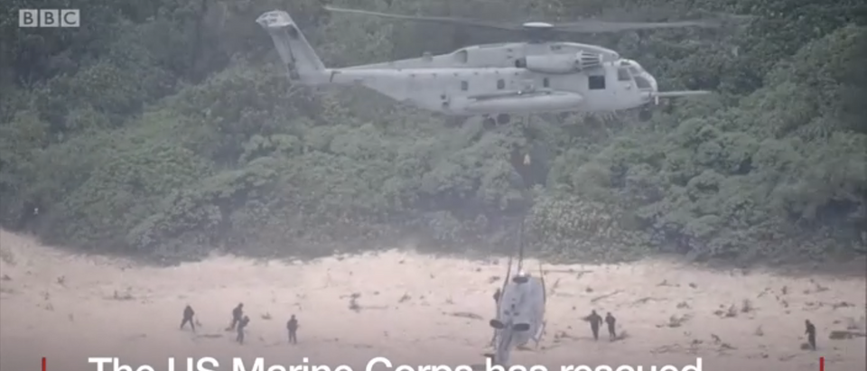 U.S. Marines on Okinawa salvage a crashed helicopter (Screenshot/BBC)