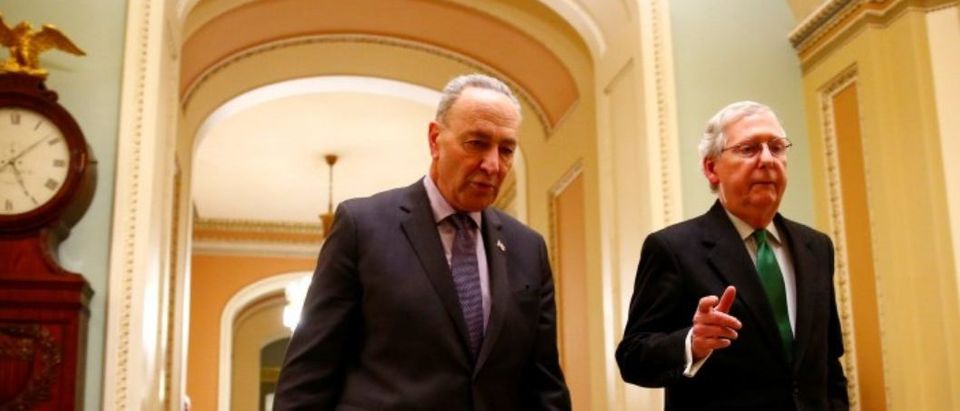 Schumer (D-NY) and McConnell (R-KY) walk to the Senate chamber on Capitol Hill in Washington