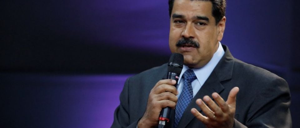 Venezuela's President Nicolas Maduro gestures as he speaks during the event launching the new Venezuelan cryptocurrency "petro" in Caracas