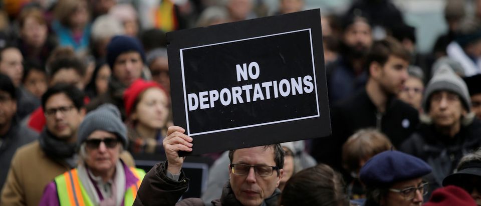 Activists demonstrate against deportation during a protest outside the Jacob Javits Federal Building in Manhattan in New York City