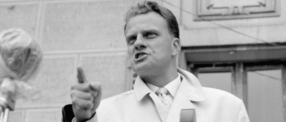 Billy Graham, the American evangelist, preaches in the 1960s in Paris. (Photo: AFP/Getty Images)