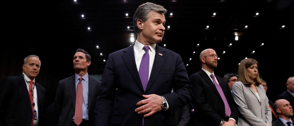 FBI Director Christopher Wray arrives to testify before the Senate Intelligence Committee on Capitol Hill in Washington, February 13, 2018. REUTERS/Aaron P. Bernstein