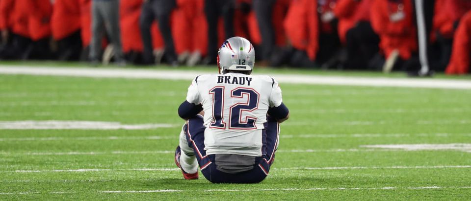 Tom Brady #12 of the New England Patriots reacts after fumbling the ball during the fourth quarter against the Philadelphia Eagles in Super Bowl LII at U.S. Bank Stadium on February 4, 2018 in Minneapolis, Minnesota.The Philadelphia Eagles defeated the New England Patriots 41-33. (Photo by Rob Carr/Getty Images)