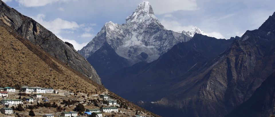 Mount Ama Dablam is seen behind Khumjung a typical Sherpa village in Solukhumbu District also known as the Everest region