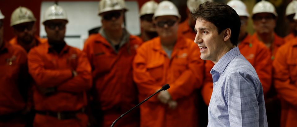 Canada's Prime Minister Justin Trudeau speaks in front of steel workers the ArcelorMittal Dofasco plant in Hamilton