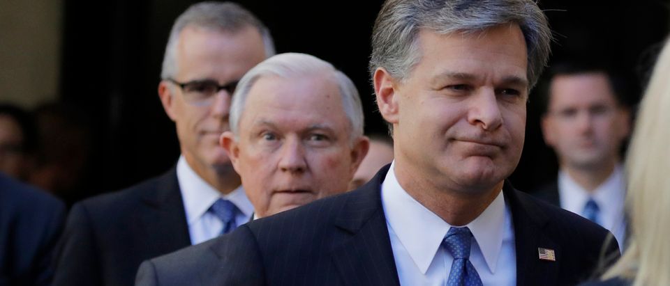 FBI Director Wray arrives with U.S. Attorney General Sessions and Acting FBI Director McCabe in Washington