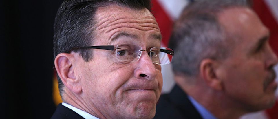 ENFIELD, CONNECTICUT - APRIL 01: Connecticut Governor Dannel Malloy sits during the dedication ceremony of the new DUI unit of the Cybulski Community Reintegration Center on April 1, 2016 in Enfield, Connecticut. Malloy's "Second Chance Society" which he signed into law in July 2015, is considered the cutting edge of progressive criminal justice reform efforts nationwide. The DUI unit is designed to prepare non-violent inmates convicted of driving under the influence of drugs or alcohol for reintegration into society at the end of their prison sentences. The initiative is also supported by Mothers Against Drunk Driving. (Photo by John Moore/Getty Images)