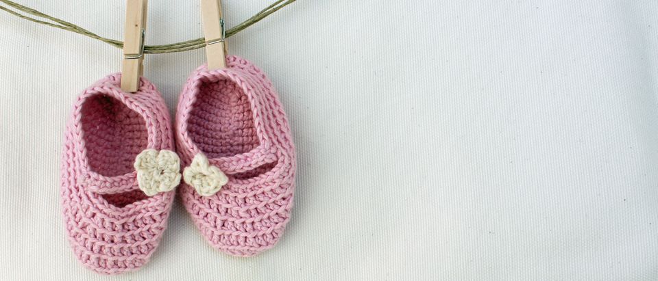 More girls would live if not for abortion | Cute girl baby shoes (Shutterstock/Ida Karolina Rosanda)