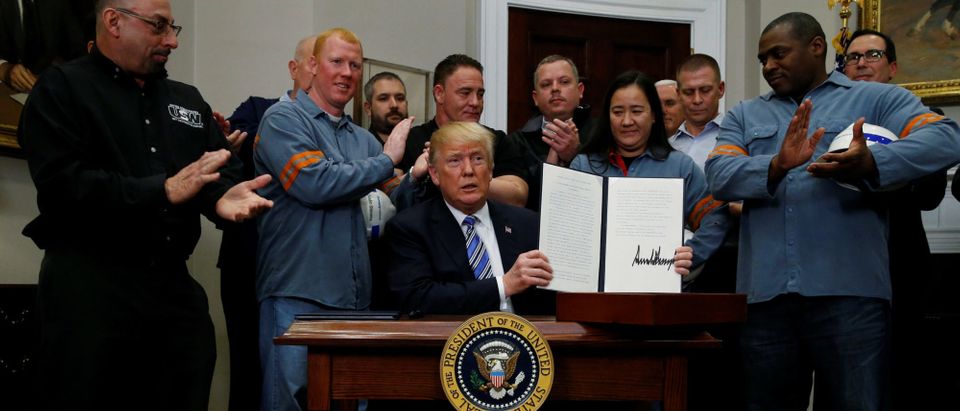 President Donald Trump is after signing a proclamation to establish tariffs on imports of steel and aluminum at the White House in Washington, March 8, 2018. REUTERS/Leah Millis