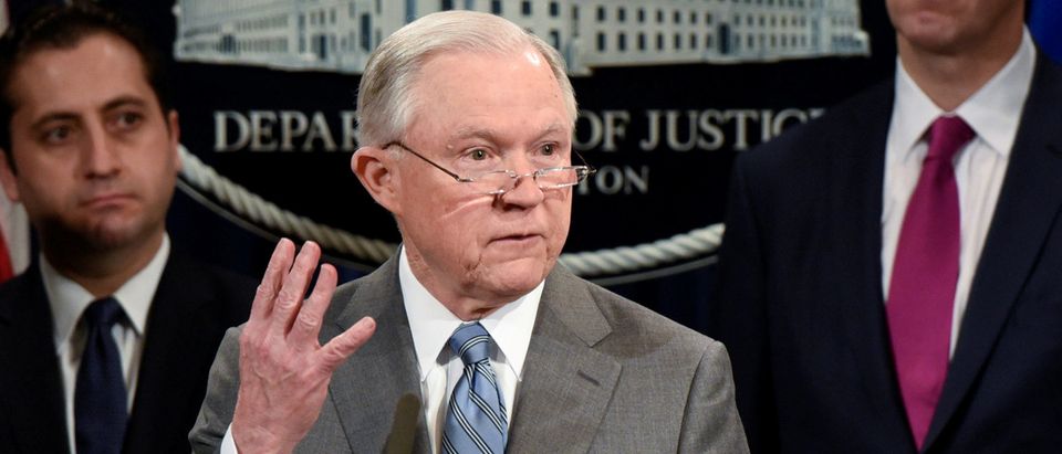 Attorney General Jeff Sessions speaks during a news conference at the Department of Justice in Washington, February 22, 2018. REUTERS/Sait Serkan Gurbuz