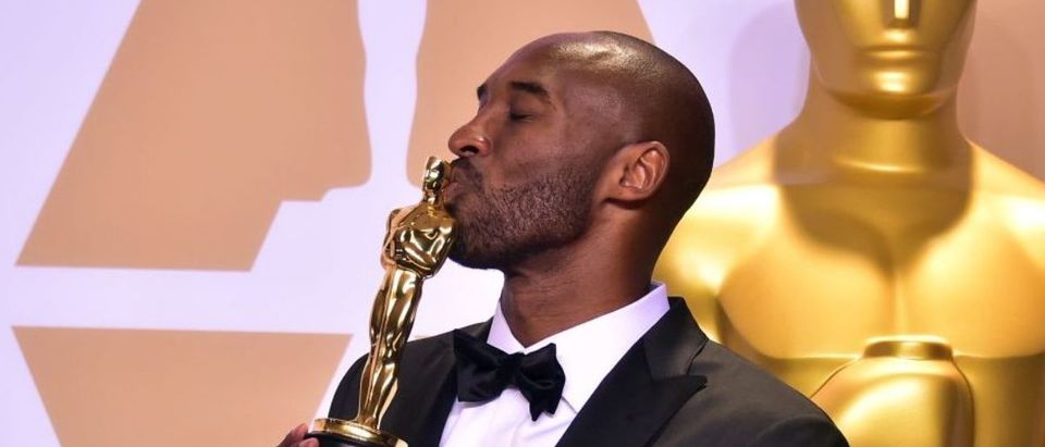 Kobe Bryant poses in the press room with the Oscar for Best Animated Short Film for "Dear Basketball," during the 90th Annual Academy Awards on March 4, 2018, in Hollywood, California. (Photo: FREDERIC J. BROWN/AFP/Getty Images)
