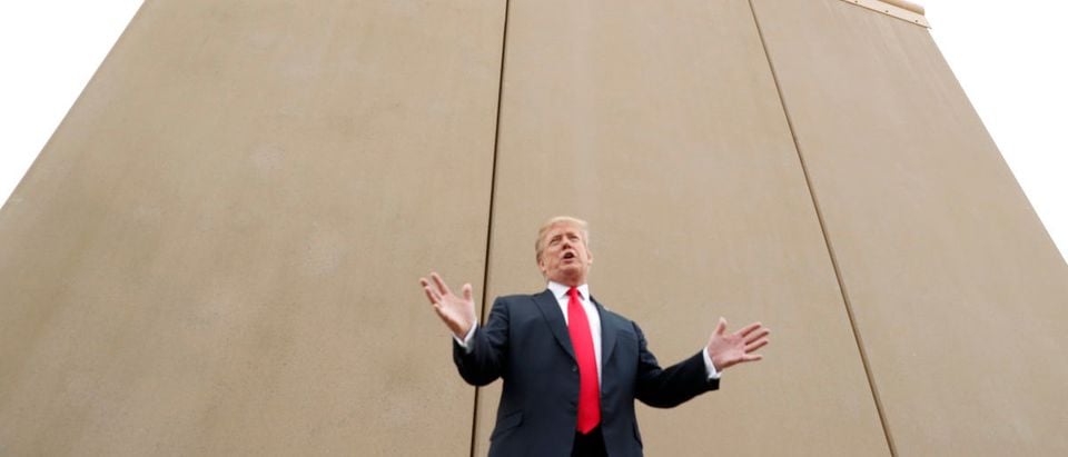U.S. President Donald Trump speaks while participating in a tour of U.S.-Mexico border wall prototypes near the Otay Mesa Port of Entry in San Diego, California. U.S., March 13, 2018. REUTERS/Kevin Lamarque