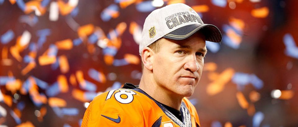 DENVER, CO - JANUARY 24: Peyton Manning #18 of the Denver Broncos looks on after defeating the New England Patriots in the AFC Championship game at Sports Authority Field at Mile High on January 24, 2016 in Denver, Colorado. The Broncos defeated the Patriots 20-18. (Photo by Ezra Shaw/Getty Images)