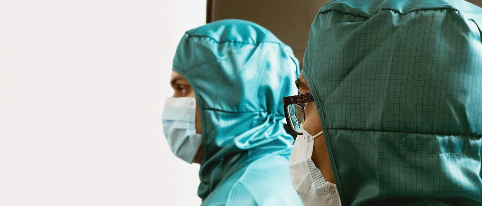 Russian Defector In Critical Condition | Protective suit | Dmitry Molchanov/Shutterstock