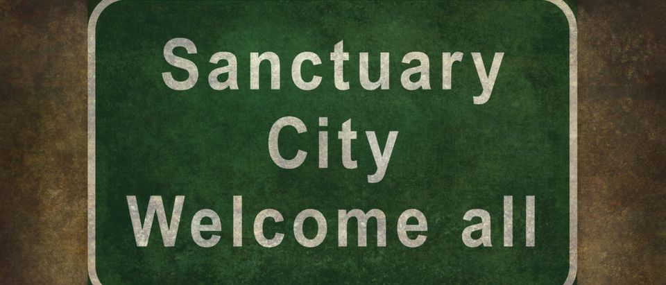 Sanctuary city welcome road sign illustration, with distressed foreboding background