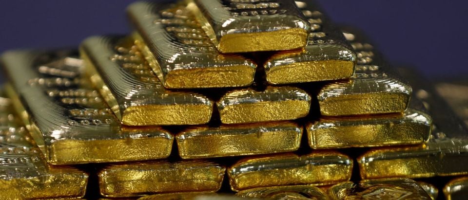 FILE PHOTO: Gold bars are seen in the Austrian Gold and Silver Separating Plant 'Oegussa' in Vienna, Austria, December 15, 2017. REUTERS/Leonhard Foeger/File Photo | Cargo Plane Drops Hundreds Of Gold Bars | Sources: Awan Trying 'To Hide...Money' Amid Probe