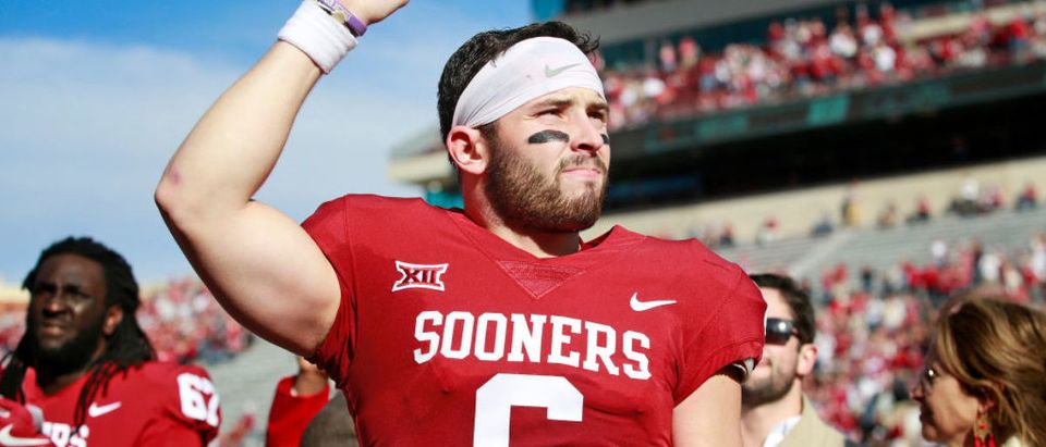 NORMAN, OK - NOVEMBER 25: Quarterback Baker Mayfield #6 of the Oklahoma Sooners gestures to the crowd after Senior Day announcements before the game against the West Virginia Mountaineers at Gaylord Family Oklahoma Memorial Stadium on November 25, 2017 in Norman, Oklahoma. Oklahoma defeated West Virginia 59-31. (Photo by Brett Deering/Getty Images)