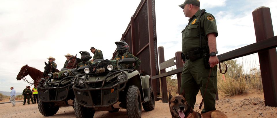 Border Patrol agents keep watch during the official start for the construction of new bollard wall to replace 20-miles of primary vehicle barriers in Santa Teresa, New Mexico, United States April 9, 2018. REUTERS/Jose Luis Gonzalez