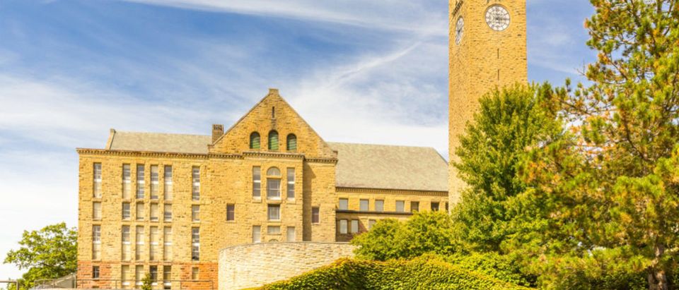 ITHACA, NY/USA - SEPTEMBER 1, 2017: Featured is the Clock Tower of Cornell University, which recently hosted a free speech/"hate speech" workshop. (Shutterstock/Mihail Degteariov)