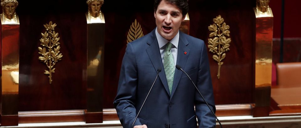Canadian Prime Minister Justin Trudeau delivers a speech at the National Assembly in Paris