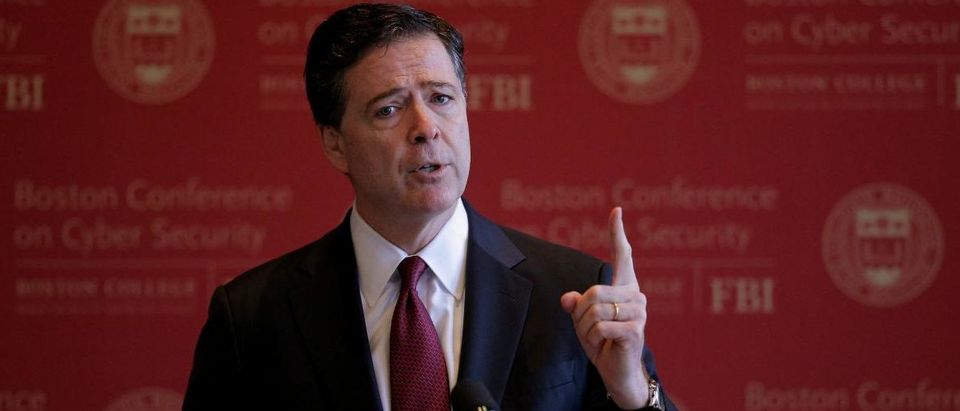 FILE PHOTO: FBI Director James Comey speaks at the Boston Conference on Cyber Security at Boston College in Boston