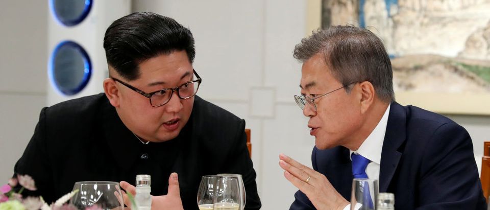 South Korean President Moon Jae-in and North Korean leader Kim Jong Un attend a banquet on the Peace House at the truce village of Panmunjom