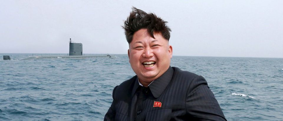 North Korean leader Kim Jong Un watches the test-fire of a strategic submarine underwater ballistic missile (not pictured), in this undated photo released by North Korea's Korean Central News Agency (KCNA) in Pyongyang on May 9, 2015. REUTERS/KCNA