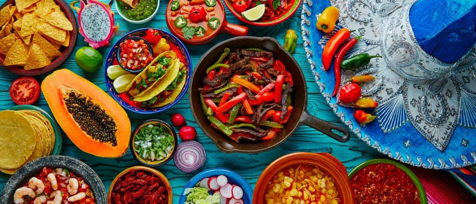 Mexican food mix colorful background Mexico and sombrero Shutterstock/Tono Balaguer | Woman Does Decolonizing Diet