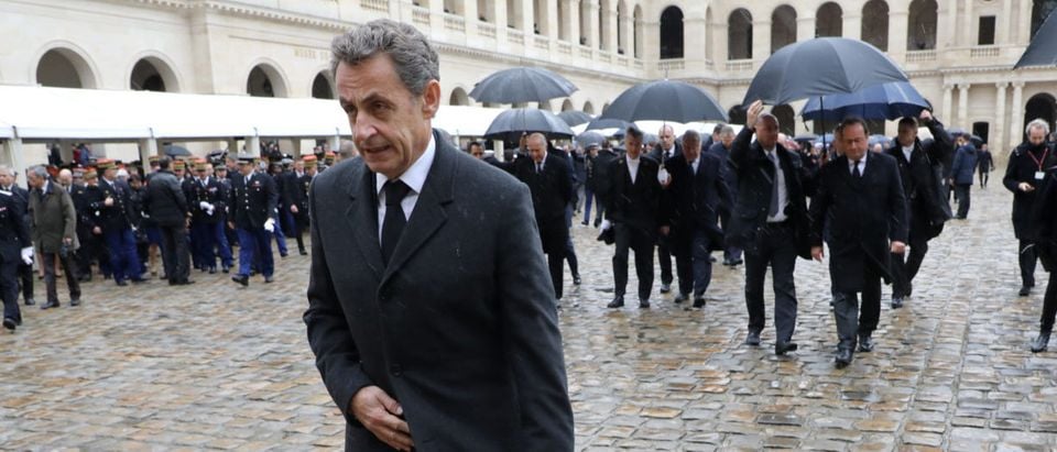 Former French President Nicolas Sarkozy leaves after a national ceremony for late Lieutenant-Colonel Arnaud Beltrame at the Hotel des Invalides in Paris, France, March 28, 2018. Beltrame was killed by an Islamist militant after taking the place of a female hostage during a supermarket siege in Trebes. Ludovic Marin/Pool via Reuters | French Leaders Decry Islamic Antisemtism