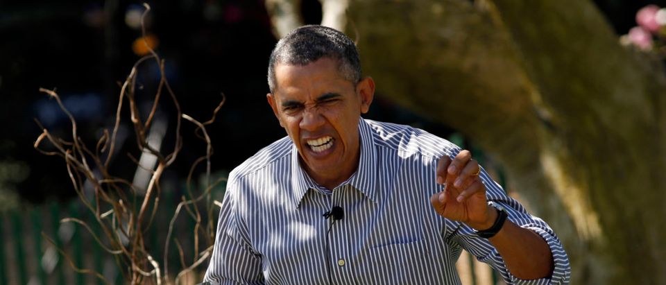 Obama acts out the line "gnashed their terrible teeth" from the children's book "Where the Wild Things Are" during the 136th annual Easter Egg Roll on the South Lawn of the White House in Washington