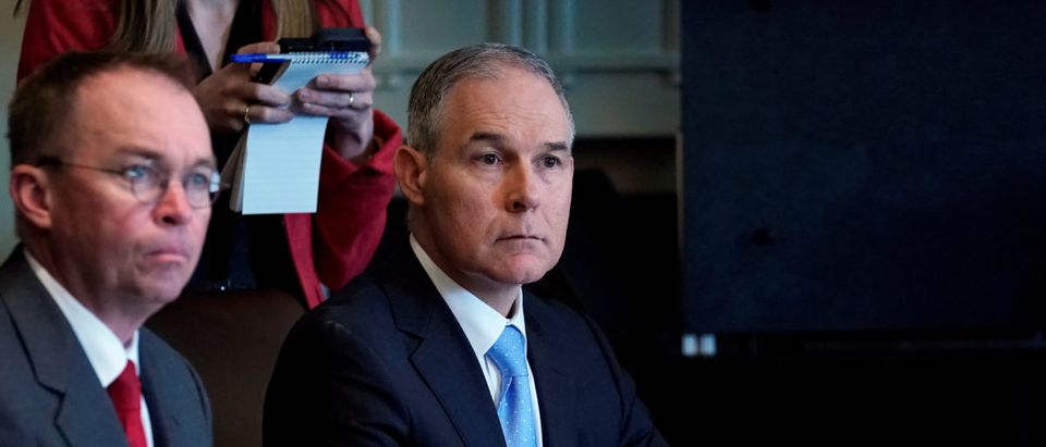 U.S. Environmental Protection Agency administrator Scott Pruitt listens as U.S. President Donald Trump holds a cabinet meeting at the White House in Washington, U.S., April 9, 2018. REUTERS/Kevin Lamarque
