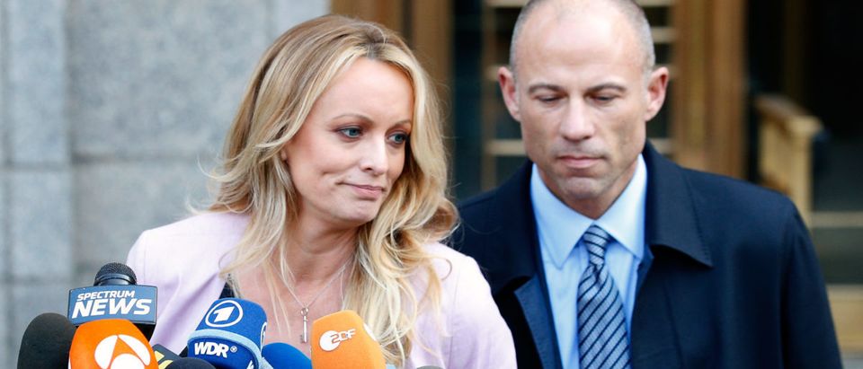 Adult film actress Stephanie Clifford, also known as Stormy Daniels, speaks to media along with lawyer Michael Avenatti outside federal court in Manhattan