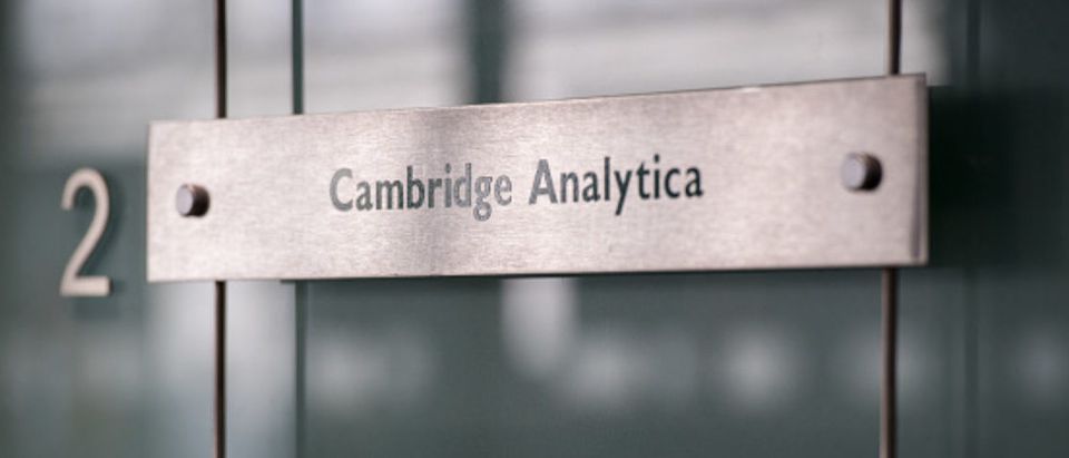 LONDON, ENGLAND - MARCH 21: Signs for company Cambridge Analytica in the lobby of the building in which they are based on March 21, 2018 in London, England. UK authorities are currently seeking a warrant to search the premises of Cambridge Analytica after the company has been involved in a row over its use of Facebook data. Their CEO Alexander Nix has since been suspended. (Photo by Chris J Ratcliffe/Getty Images)