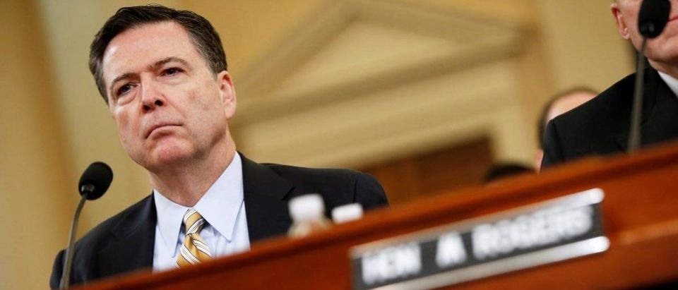 FILE PHOTO: Comey testifies before the House Intelligence Committee hearing into alleged Russian meddling in the 2016 U.S. election, on Capitol Hill in Washington