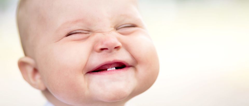 Cute smiling baby (Shutterstock/Max Bukovski) | Pro-Life Vans Saving Babies From Abortion