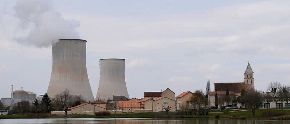Steam rises from a cooling tower of the Electricite de France (EDF) nuclear power station in Civaux