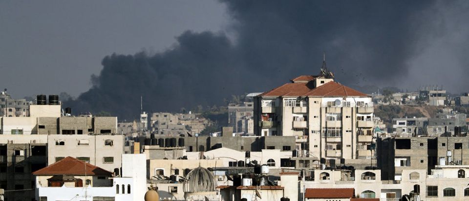 A picture taken from Gaza City on May 29, 2018 shows smoke billowing in the background following an Israeli air strike on the Palestinian coastal enclave. - Israel's military struck more than 30 "military targets" in the Gaza Strip today in response to a barrage of rocket and mortar fire from the Palestinian enclave, the army said. THOMAS COEX/AFP/Getty Images | Israel Hits Hamas With Airstrikes In Gaza
