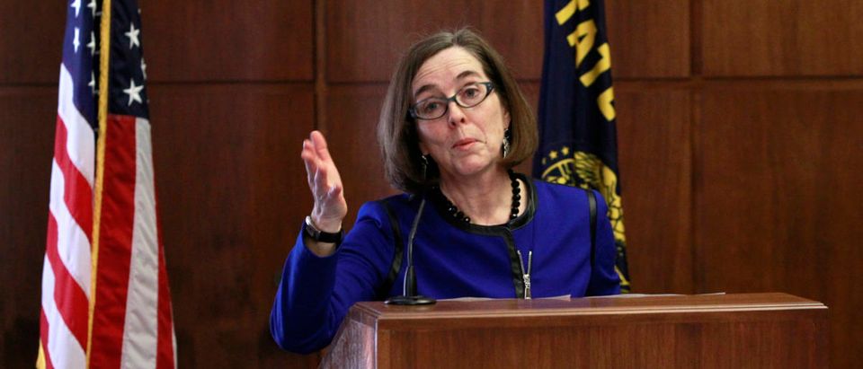 Oregon Governor Kate Brown speaks at the state capital building in Salem, Oregon , February 20, 2015. Brown, a liberal Democrat from Portland, outlined her policy agenda on Friday in her first media event since she took the helm of the Pacific Northwest state to replace John Kitzhaber, whose decades-long political career dissolved in the wake of an influence-peddling scandal involving his fiancee. REUTERS/Steve Dipaola | OR Gov Redacts Thousands Of Meetings