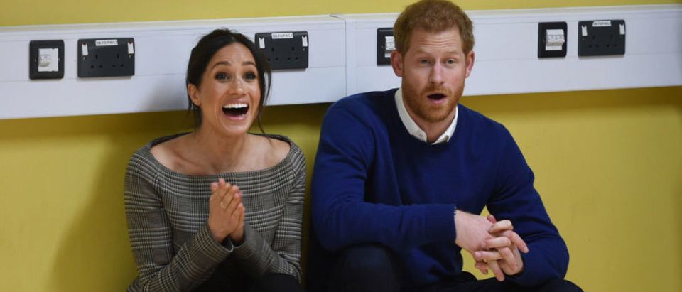 Prince Harry and his fiancee Meghan Markle attend a street dance class during their visit to Star Hub on January 18, 2018 in Cardiff, Wales. (Photo by Geoff Pugh - WPA Pool/Getty Images)