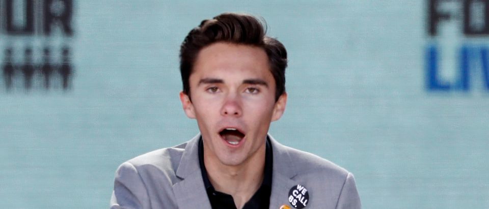 David Hogg, a student at the Marjory Stoneman Douglas High School, site of a February mass shooting which left 17 people dead in Parkland, Florida, speaks as students and gun control advocates hold the "March for Our Lives" event demanding gun control after recent school shootings at a rally in Washington, U.S., March 24, 2018. REUTERS/Aaron P. Bernstein