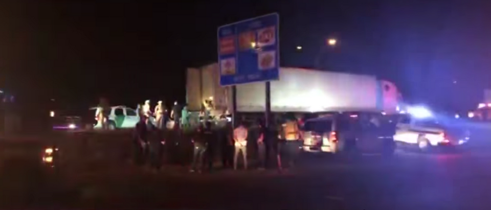 Nearly 100 illegal immigrants were found inside a tractor trailer outside Raymondville, Texas, according to a Tuesday report. (Screen Shot:Youtube:KENS 5:92 Illegal Immigrants Found In Trailer)