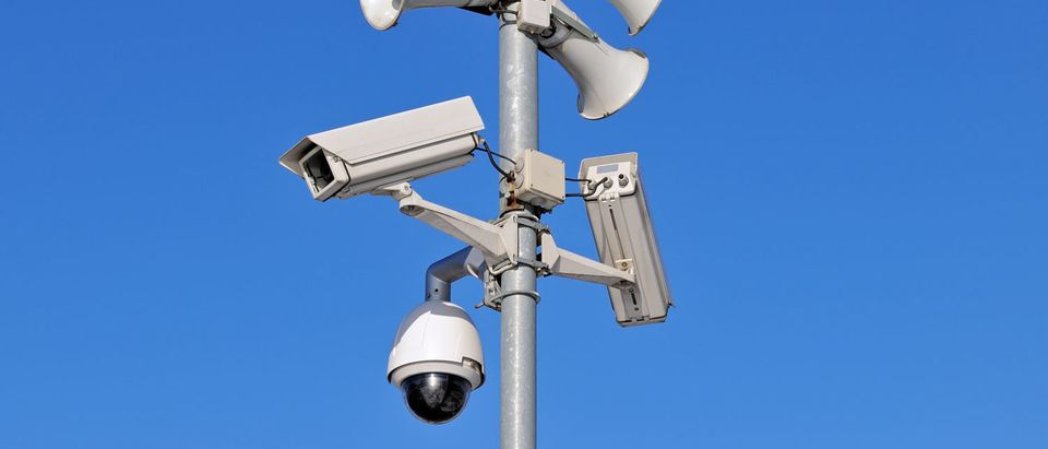 Surveillance cameras pointed down towards the citizenry. [Shutterstock - FedotovAnatoly] | Oakland's Bill To Limit Surveillance Tech