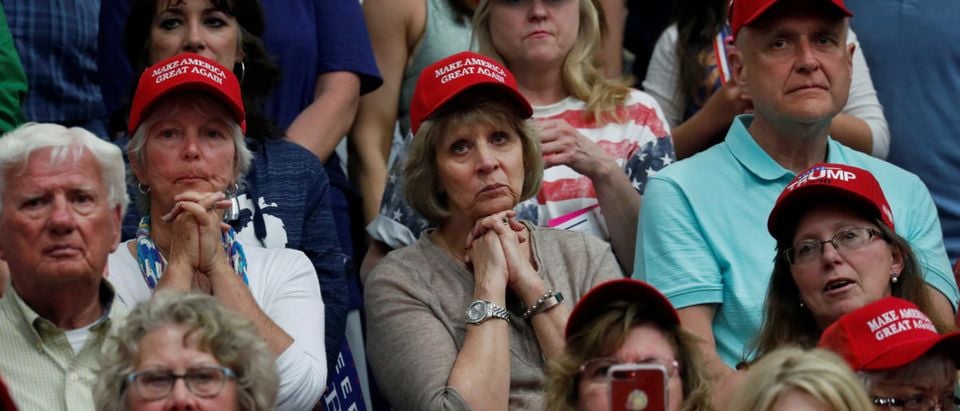 Supporters listen with rapt attention to U.S. President Donald Trump during a rally at North Side middle school in Elkhart, Indiana, U.S., May 10, 2018. REUTERS/Leah Millis | Liberal Writers Quit White Trump Voters