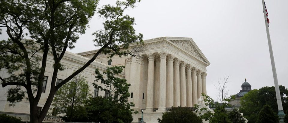 The Supreme Court stands before a decision was released allowing the legalization of sports betting in Washington, U.S., May 14, 2018. REUTERS/Joshua Roberts | Supreme Court Silent In Garza Case