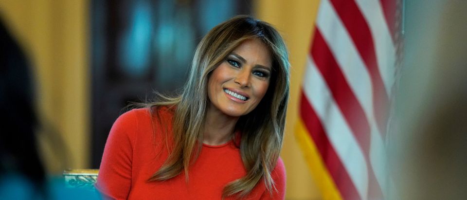 FILE PHOTO: U.S. first lady Melania Trump sits during a listening session with students at the White House in Washington, U.S., April 9, 2018. REUTERS/Joshua Roberts/File Photo - RC1A081B3A50