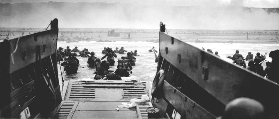 A LCVP (Landing Craft, Vehicle, Personnel) from the U.S. Coast Guard-manned USS Samuel Chase disembarks troops of the U.S. Army's First Division on the morning of June 6, 1944 (D-Day) at Omaha Beach.