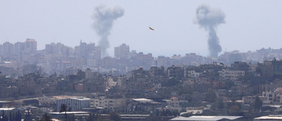 Smoke rises following an Israeli air strike in the Gaza Strip, as seen from the Israeli side of the border between Israel and Gaza