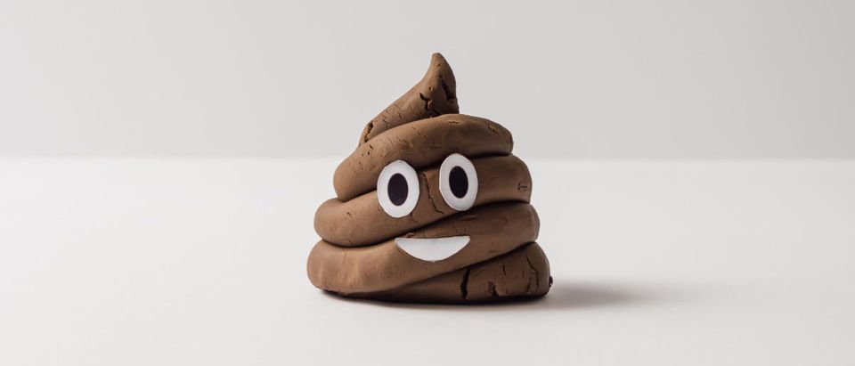 Poop emoticon on bright background. (Image: Shutterstock.com)