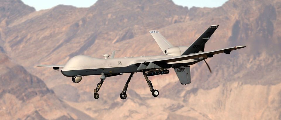 INDIAN SPRINGS, NV - NOVEMBER 17: An MQ-9 Reaper remotely piloted aircraft (RPA) flies by during a training mission at Creech Air Force Base on November 17, 2015 in Indian Springs, Nevada. The Pentagon has plans to expand combat air patrols flights by remotely piloted aircraft by as much as 50 percent over the next few years to meet an increased need for surveillance, reconnaissance and lethal airstrikes in more areas around the world. (Photo by Isaac Brekken/Getty Images)